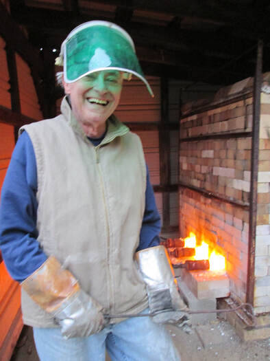 Ren Parziale making sure the kiln keeps up to temperature while he and Pam finish off another batch of Sycamore Pottery
